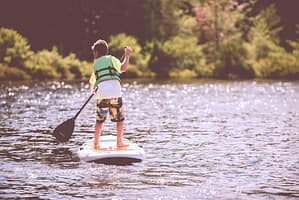 Kid on paddle board